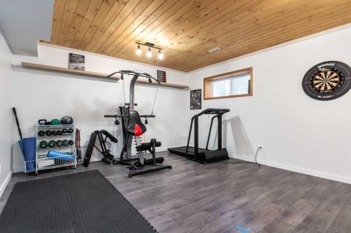 26 Mount Rae Terrace, Okotoks, AB - Indoor Photo Showing Gym Room