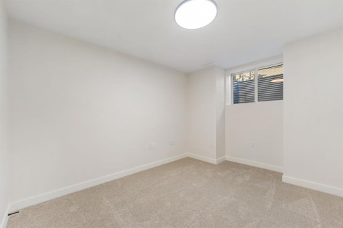 125 Discovery Place Sw, Calgary, AB - Indoor Photo Showing Other Room