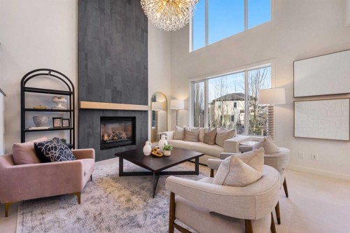 125 Discovery Place Sw, Calgary, AB - Indoor Photo Showing Living Room With Fireplace