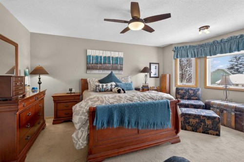 204 Sunrise Circle Se, Calgary, AB - Indoor Photo Showing Bedroom