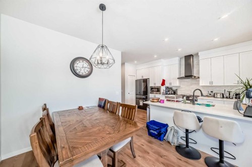 160 Lucas Common Nw, Calgary, AB - Indoor Photo Showing Dining Room