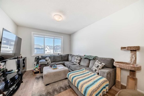 160 Lucas Common Nw, Calgary, AB - Indoor Photo Showing Living Room