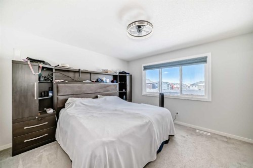160 Lucas Common Nw, Calgary, AB - Indoor Photo Showing Bedroom