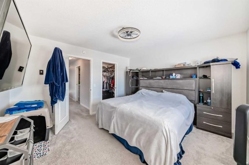 160 Lucas Common Nw, Calgary, AB - Indoor Photo Showing Bedroom