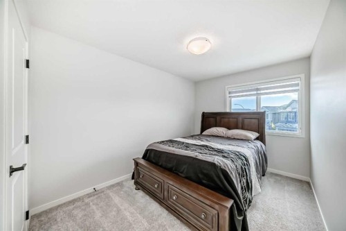 160 Lucas Common Nw, Calgary, AB - Indoor Photo Showing Bedroom