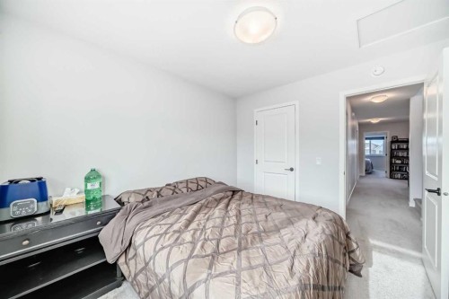 160 Lucas Common Nw, Calgary, AB - Indoor Photo Showing Bedroom