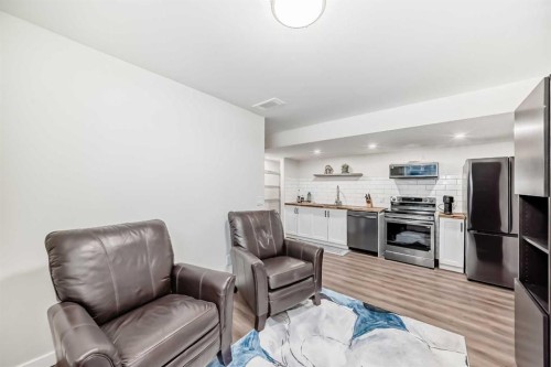 160 Lucas Common Nw, Calgary, AB - Indoor Photo Showing Living Room