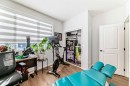 160 Lucas Common Nw, Calgary, AB  - Indoor Photo Showing Gym Room 