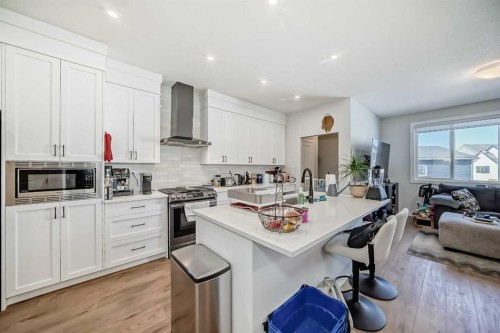 160 Lucas Common Nw, Calgary, AB - Indoor Photo Showing Kitchen With Upgraded Kitchen