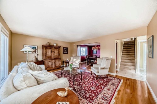 6007 Dalcastle Crescent Nw, Calgary, AB - Indoor Photo Showing Living Room