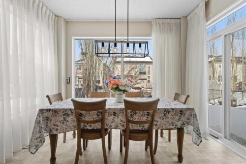 98 Cougarstone Close Sw, Calgary, AB - Indoor Photo Showing Dining Room