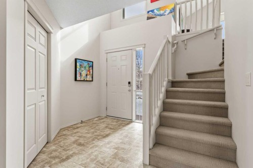 98 Cougarstone Close Sw, Calgary, AB - Indoor Photo Showing Other Room