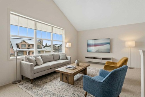 98 Cougarstone Close Sw, Calgary, AB - Indoor Photo Showing Living Room