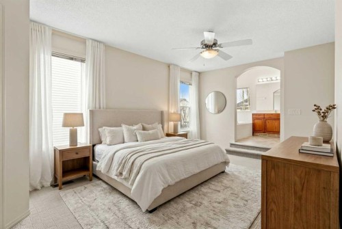 98 Cougarstone Close Sw, Calgary, AB - Indoor Photo Showing Bedroom