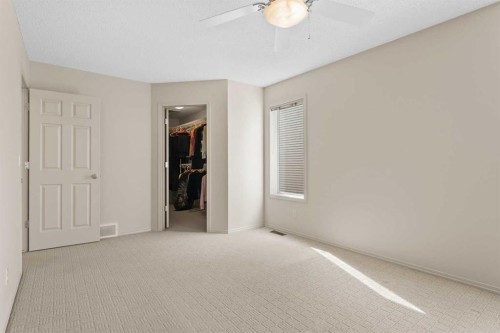 98 Cougarstone Close Sw, Calgary, AB - Indoor Photo Showing Other Room