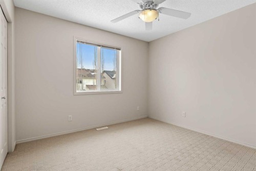 98 Cougarstone Close Sw, Calgary, AB - Indoor Photo Showing Other Room