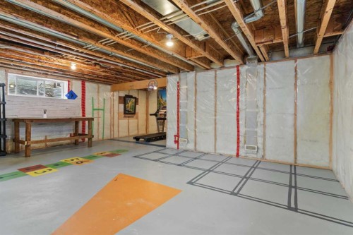 98 Cougarstone Close Sw, Calgary, AB - Indoor Photo Showing Basement
