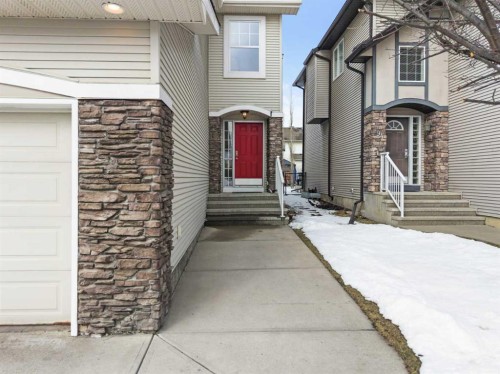 98 Cougarstone Close Sw, Calgary, AB - Outdoor With Facade