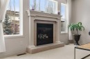 98 Cougarstone Close Sw, Calgary, AB  - Indoor With Fireplace 