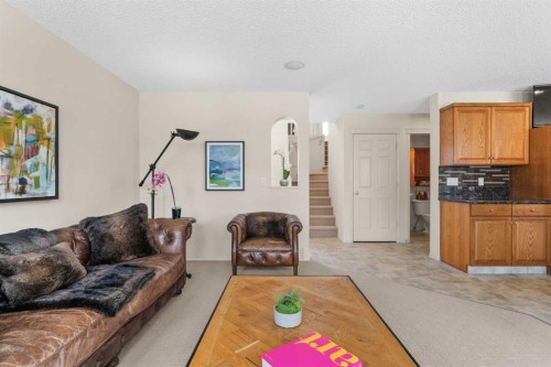 98 Cougarstone Close Sw, Calgary, AB - Indoor Photo Showing Other Room