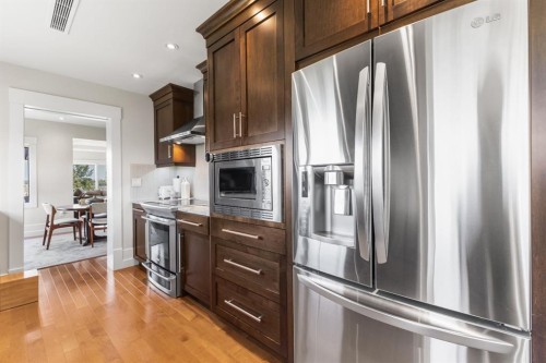 4N-222 Eagle Ridge Drive Sw, Calgary, AB - Indoor Photo Showing Kitchen With Stainless Steel Kitchen