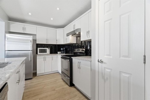405 Windstone Grove Sw, Airdrie, AB - Indoor Photo Showing Kitchen With Stainless Steel Kitchen