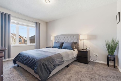 405 Windstone Grove Sw, Airdrie, AB - Indoor Photo Showing Bedroom