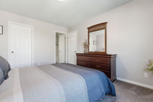 405 Windstone Grove Sw, Airdrie, AB - Indoor Photo Showing Bedroom