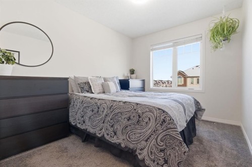 405 Windstone Grove Sw, Airdrie, AB - Indoor Photo Showing Bedroom