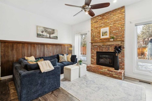 119 Midland Crescent Se, Calgary, AB - Indoor Photo Showing Living Room With Fireplace