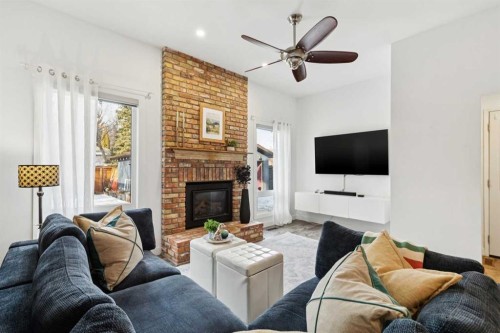 119 Midland Crescent Se, Calgary, AB - Indoor Photo Showing Living Room With Fireplace