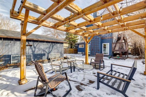 119 Midland Crescent Se, Calgary, AB - Outdoor With Fireplace With Deck Patio Veranda