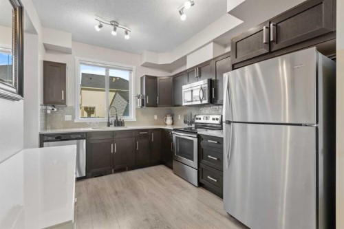 56 Legacy Main Street Se, Calgary, AB - Indoor Photo Showing Kitchen With Upgraded Kitchen