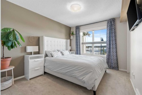 56 Legacy Main Street Se, Calgary, AB - Indoor Photo Showing Bedroom
