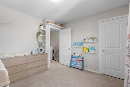 56 Legacy Main Street Se, Calgary, AB - Indoor Photo Showing Bedroom