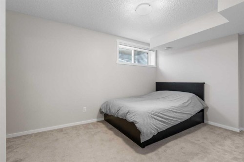 56 Legacy Main Street Se, Calgary, AB - Indoor Photo Showing Bedroom