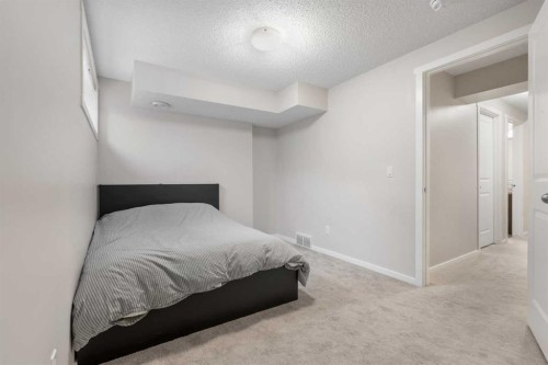 56 Legacy Main Street Se, Calgary, AB - Indoor Photo Showing Bedroom