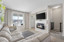 56 Legacy Main Street Se, Calgary, AB  - Indoor Photo Showing Living Room With Fireplace 