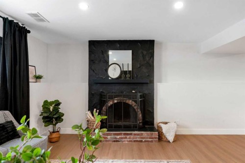 2416 Palliser Drive Sw, Calgary, AB - Indoor With Fireplace