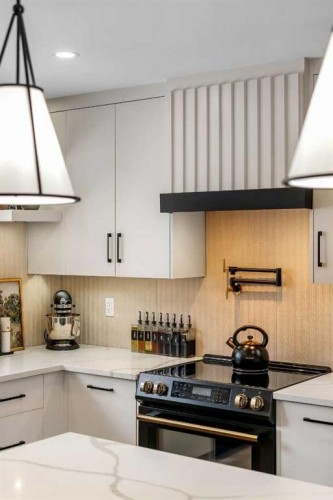 2416 Palliser Drive Sw, Calgary, AB - Indoor Photo Showing Kitchen With Upgraded Kitchen