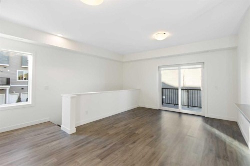 404-24 Rivercrest Drive, Cochrane, AB - Indoor Photo Showing Other Room