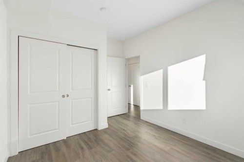 404-24 Rivercrest Drive, Cochrane, AB - Indoor Photo Showing Other Room