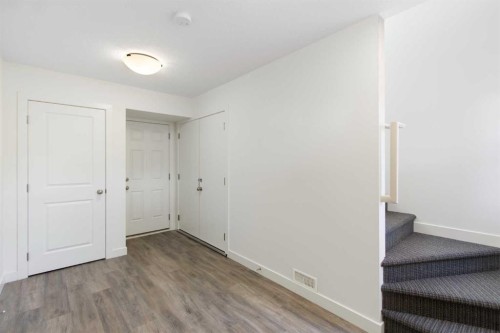 404-24 Rivercrest Drive, Cochrane, AB - Indoor Photo Showing Other Room