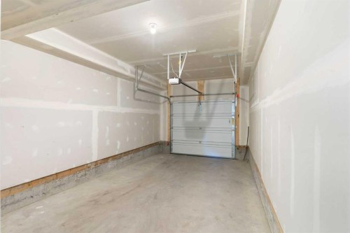 404-24 Rivercrest Drive, Cochrane, AB - Indoor Photo Showing Garage