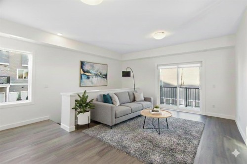 404-24 Rivercrest Drive, Cochrane, AB - Indoor Photo Showing Living Room