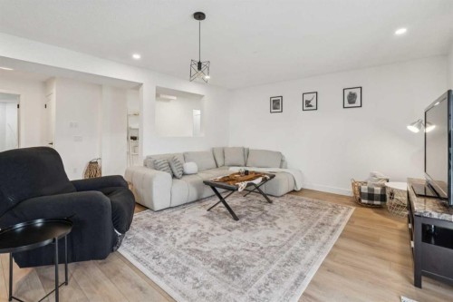 194 Martinglen Way Ne, Calgary, AB - Indoor Photo Showing Living Room