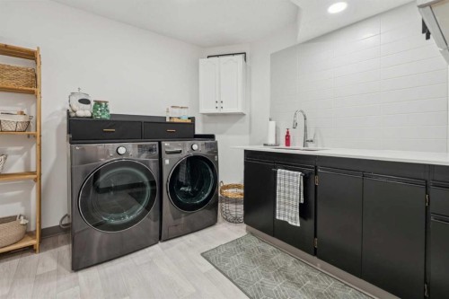 194 Martinglen Way Ne, Calgary, AB - Indoor Photo Showing Laundry Room