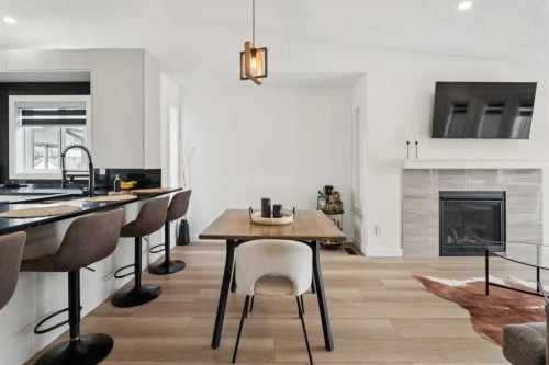 194 Martinglen Way Ne, Calgary, AB - Indoor Photo Showing Other Room With Fireplace