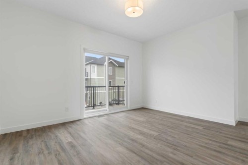 1701-24 Rivercrest Drive, Cochrane, AB - Indoor Photo Showing Other Room