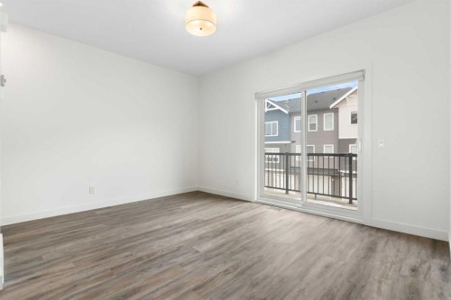 1701-24 Rivercrest Drive, Cochrane, AB - Indoor Photo Showing Other Room